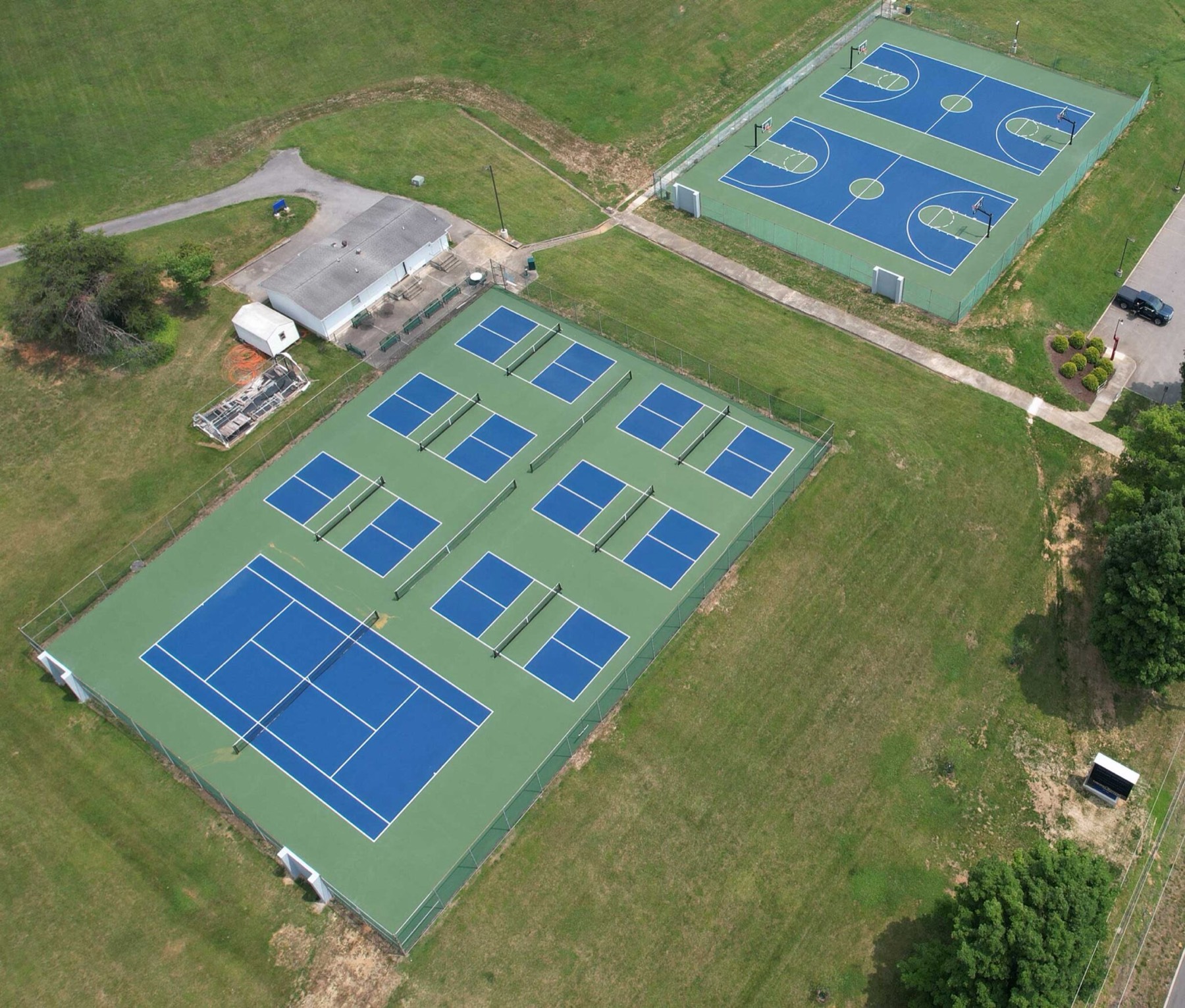 Aerial view of new pickleball, tennis, and basketball courts built by ACE Sport Surfaces